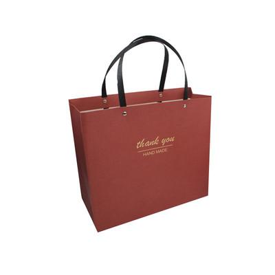 China Recyclable Big Size Printed Paper Bag Gift Kraft Cheap Packaging Shopping Paper Bags for sale