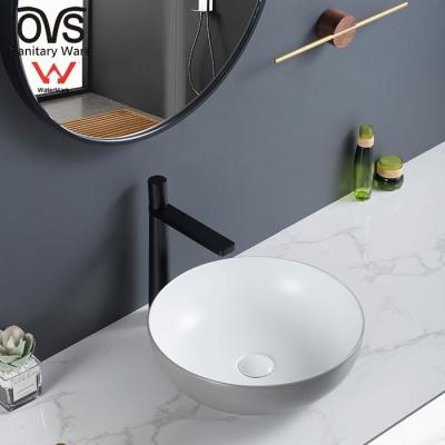 China Chinese OVS Filigree Australia Modern Sleek Bathroom Sink Bowls Sleek Ceramic Wash Basin for sale