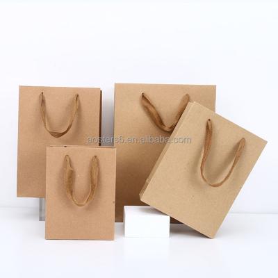 China Recycled materials wholesale custom logo size color paper bags with your own logo kraft paper bag paper bags for sale