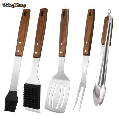 China Easily Cleaned 5 Pcs BBQ Grill Tool Kit Stainless Steel Spatula Fork And Tongs Complete Grilling Accessories With Wooden Handle for sale