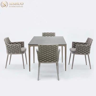 China Modern Luxury Outdoor Weather Furniture Patio Rattan Furniture Outside Restaurant Garden Dining Furniture Set All Weather Outdoor Table and Chair Set for sale