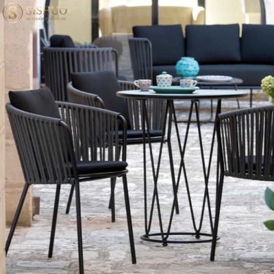 China Hotel Outdoor Modern Outdoor Restaurant Garden Furniture Weather Stackable Dining Table And Chairs Rope Garden Chairs Set For Cafe for sale