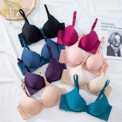 China Hot popular girls QUICK DRY ladies fancy seamless bra with butterfly lace back seamless lift up the bra for sale