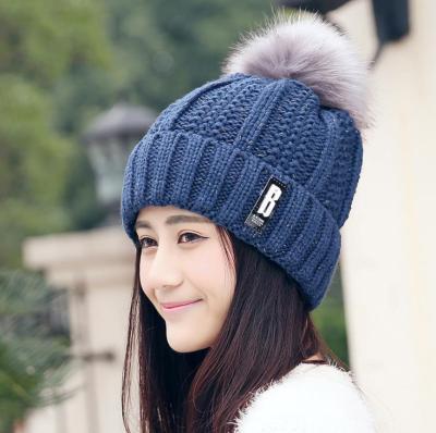 China Custom Warm Woolen Knitted Beanies Winter COMMON Korean Thick Wool Ear Protection Cap Hat Letter B for sale