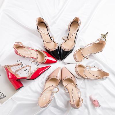 China Bridal Rivet Mouth Shoes Thick Heel Women's Shallow Shoes Pointed High Heels for sale