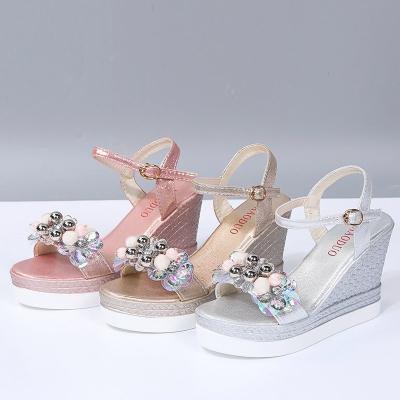 China New Summer Breathable Platform Sandals Wedge Flower Women's High Heel Sandals for sale