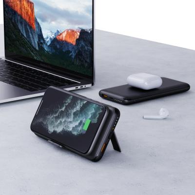 China Quick Charge Support Best Selling Multifunctional 10000 mAh Power Bank with 10W Wireless Charging and 18W PD Charging Stand Foldable for sale