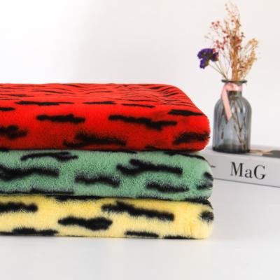 China Tiger Stripes Faux Rabbit Fur Fabric 100% Polyester Animal Fur For Toys Bags Coat Slippers for sale