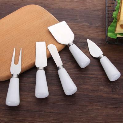 China Sustainable Wholesale Cheese Knife Set Cheese Knife With Porcelain Handle for sale