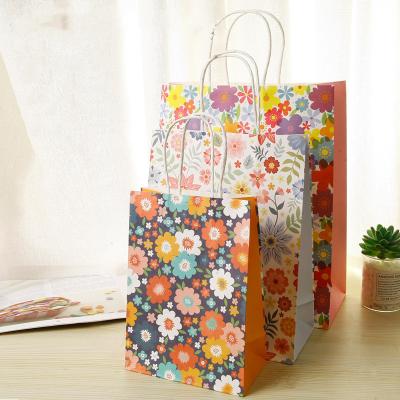 China Recyclable High Quality Low Price Luxury Paper Gift Bag Pretty Customized Shopping Clothing Bags Small Paper Bag for sale