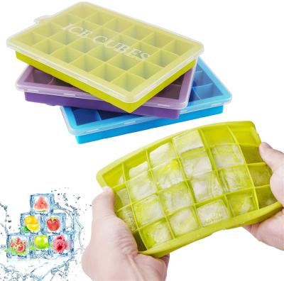 China Stocked Reusable Food Grade BPA Free Rubber Ice Cube Molds Silicone Ice Cube Trays With Lid for sale