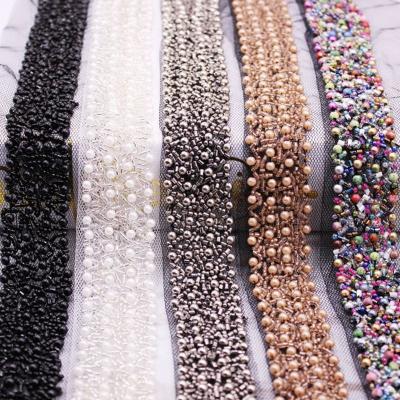 China Morden Beaded Lace Up Ribbon Bridal Dress Decoration Handmade Pearl Sewing Trim With Net Strap for sale