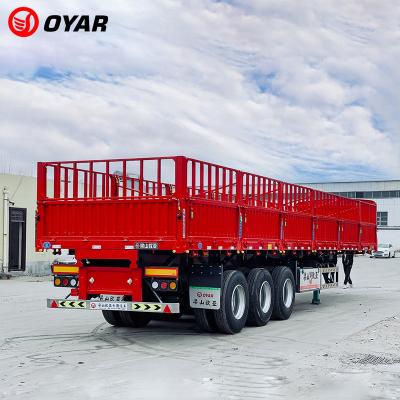 China Oyar Truck Trailer 2/3/4 Axle Side Tilting Sidewall Semi Trailer Sidewall Tipper Dump Semi Trailer Truck Trailer for sale