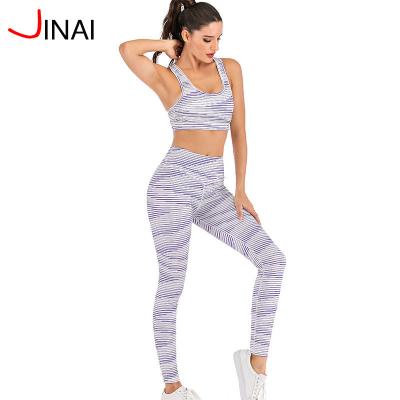 China Striped Waist Antibacterial Antibacterial Yoga Moisture Wicking Pants Women Sports Shockproof Gathered Top And Bra 2 Piece Set Yoga Overalls for sale