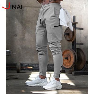 China Men's Breathable Jogger Panties With Elastic Logo Zipper Pocket Running Sweatpants Workout Pants Custom Made Mens Pants for sale