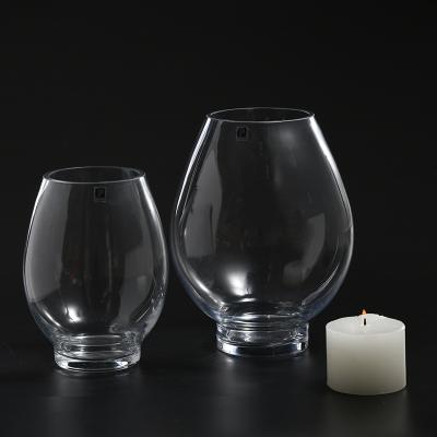 China Hot sale home hand supply factory decoration candle container blown transparent glass candle holder for home decoration for sale