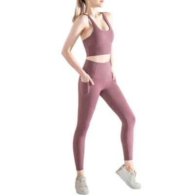 China New Breathable Women Gym Clothing Yoga Leggings With Pockets Tummy Control Sports Pants for sale