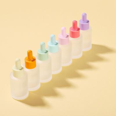 China Do you supply multiple color 30ml Macaron face flat serum design empty shoulder essential oil frosted dropper bottle for sale