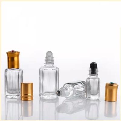 China Oi Essential Wholesale 3ml Octagon Empty Clear Attar Roll On Glass Bottles Glass Essential Oil Roller Bottles for sale