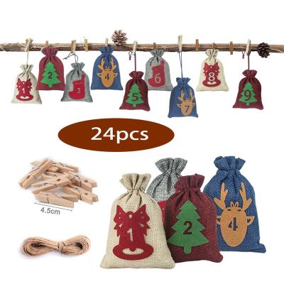 China Eco-Friendly Christmas Advent Calendar Bags Christmas Cloth Bags Advent Calendar Stickers Christmas Countdown Clip Gift Bag for sale