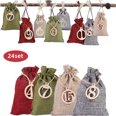 China Eco-Friendly Christmas Advent Calendar Bag 24 Days Countdown Calendar Christmas Burlap Hanging Gift Candy Bags for sale