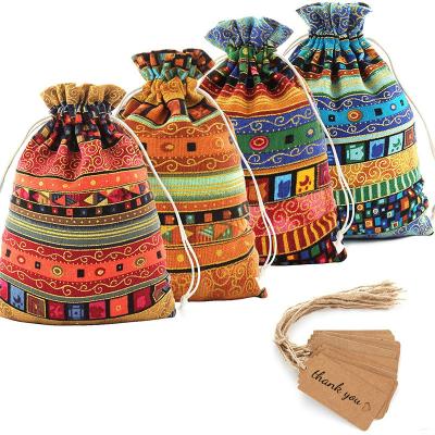 China Durable Egyptian Style 24pack Jewelry Candy Pouch Drawstring Ethnic Gift Bags Cotton Fabric Pouch With Tags Strings For Gift for sale