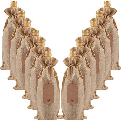 China Durable 10pack Jute Burlap Wine Bags Drawstring Wine Bottle Covers with Labels for Christmas Wedding Birthday Holiday Party for sale