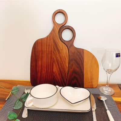 China Solid Wood Chopping Board Lovers' Black Walnut Cutting Plate for sale