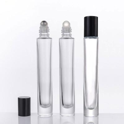 China Eco-friendly Recyclable Stock Top Selling Clear Stainless Steel Trackball Roll On Bottle Glass Cosmetic Perfume Bottle for sale