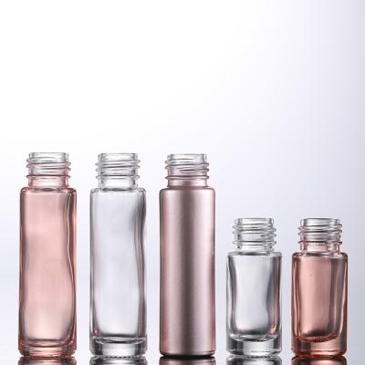 China Eco-friendly 5ml 10ml recyclable bulk clear frosted pink painted glass roll on bottle with glass rollerball for perfume packaging for sale