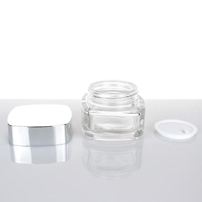 China Eco-friendly Luxury Recycled Refillable Glass Square Maker Jar Cream Jar For Cosmetic Packaging for sale