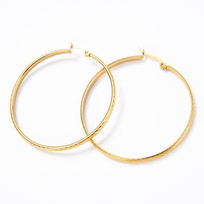 China CLASSIC trendy jewelry cut out twisted real gold plated embossed lines of wire hoop earrings hoop earring for women for sale