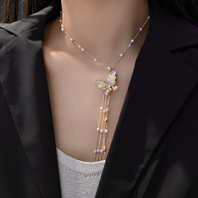 China Beautiful Butterfly Pearl Tassel Ladies Korean Long Necklace Hiphop Enamel Butterfly Sweater Crystal Necklace for sale