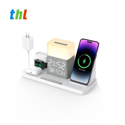 China LED Display THL 9 in 1 bluetooth night light wireless charging led night light mul-tifuntional earphone watch phone bedroom night light for sale