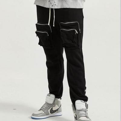 China 100% Cotton Men's Cargo Resistant Cutsom Trend Anti-Wrinkle Retail Resistant Men's Loose Zipper Sweatpants for sale