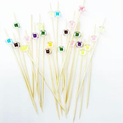 China Wholesale Cheap Decorative Floral Twist Heart Food Finger Pick Cake Fruit Cake Fruit Easily Cleaned Stick Bamboo Skewer for sale