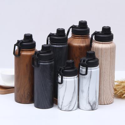 China Carabiner Hiking Sports Water Bottle Vacuum Insulated Stainless Steel Flask Thermos With Handle for sale