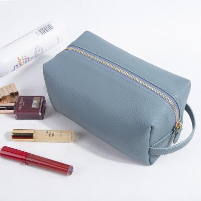 China High quality genuine leather cosmetic bags women travel or fashion pouches make up bags with personal logo made in china toiletry bag for sale