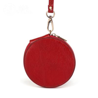 China Custom Genuine Leather Round Mini Coin Purse 2021 Mini Coin Purse Coin Purse Card Holder for sale