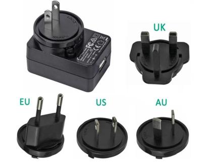 China Universal do adaptador do carregador da tomada da UE dos E.U. Reino Unido o multi obstrui na fonte de alimentação de DC de 12W 24V à venda