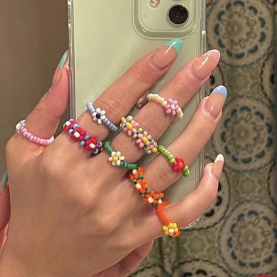 China Pearl Rice Flower Style Holiday Geometric Ring Woman Cute Colorful Bohemian Plastic Rings Accessories Geometric Children Ring Gift for sale