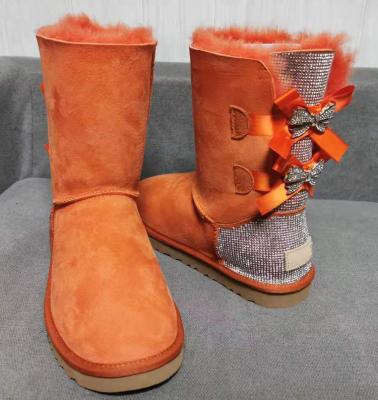 China Height Increasing 2022 New Design Suede Snow Boot Women High Quality Diamond 2 Bows Knee High Snow Boot Woman Winter Shoes Luxury Boots For Women for sale