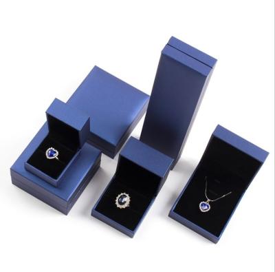 China Luxury Logo Plastic Custom Size Jeweley Box Necklaces Rings Earrings Packaging Gift Box for sale