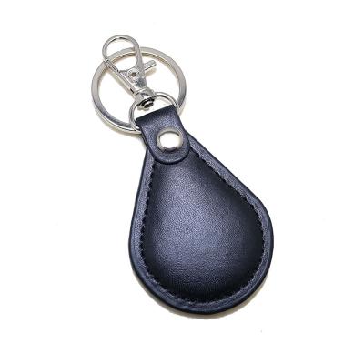 China Genuine Leather Customize Debossed Classic Leather Key FOB Logo MIFARE 13.56MHz RFID Tag for sale