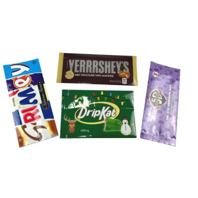 China Custom Logo Printing Mylar Bags Disposable Aluminum Foil Sachets Honey Candy Sachets Chocolate Bar Packaging for sale