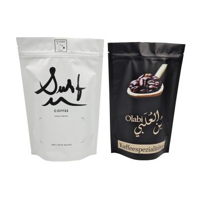 China Custom Logo Plastic Stand Up Bags With Degassing Valve 100g 250g Coffee Bean Plastic Packaging Bags for sale