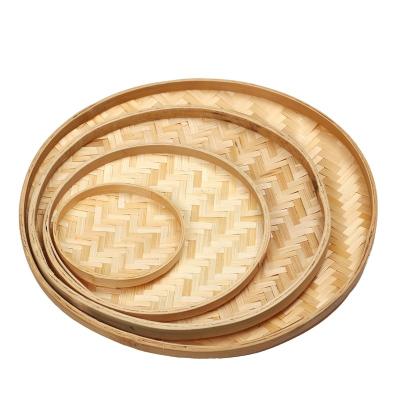 China Sustainable Support Custom Pattern Bamboo Fiber Storage Trays Round Natural Hand Crafted Woven Bamboo Serving Tray for sale