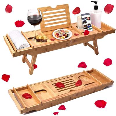 China Sustainable Natural Bamboo Wooden Tub Caddy Tray With Extendable Arms And Adjustable Legs for sale