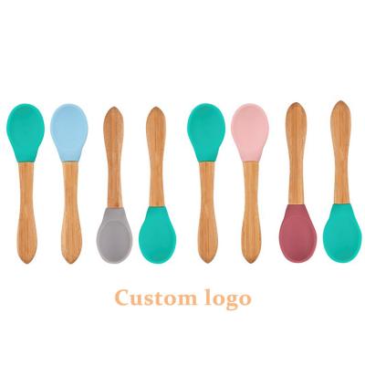 China BPA Free Wholesale Safety Food Grade Non-Toxic Bamboo Wooden Kids Handle Heart Silicone Fork Baby Silicone Spoon Set for sale