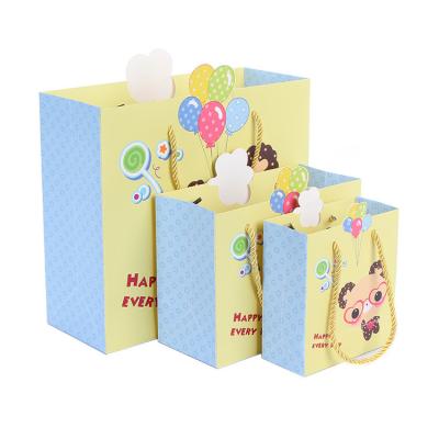 China Wholesale Recyclable Cartoon Gift Paper Bag with Logo Lamination Packaging Paper Bags for Kids Gift for sale